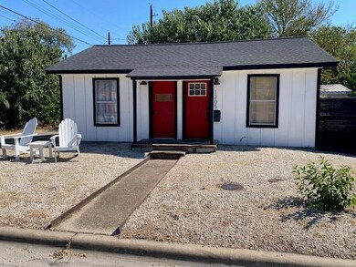 View of front of property with board and batten s