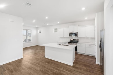 Kitchen featuring stainless steel appliances, dec