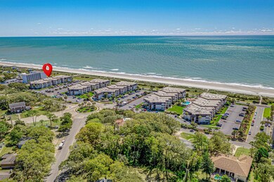 Bird's eye view with a beach view and a water view