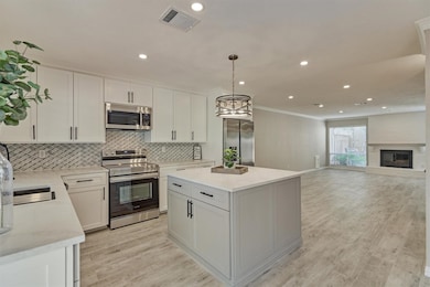 This remodeled kitchen features the new trend on k