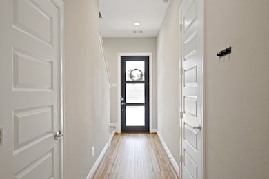 The first floor features 8-foot interior doors, ad