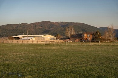 Looking south from the center pasture at the home,