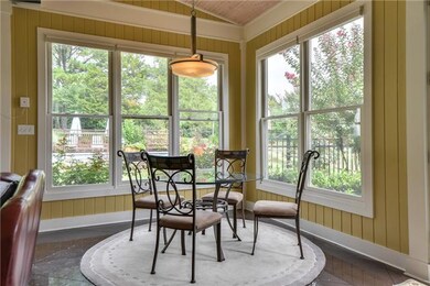 Enjoy your morning coffee in the Florida room.  With views of the lush landscape and pool, this breakfast area is the perfect place to start your day.