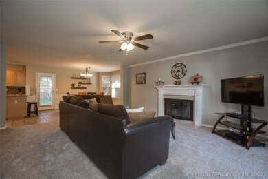 Great Room features crown moulding and updated cei