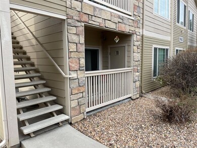 Covered side patio area behind curtains in living 