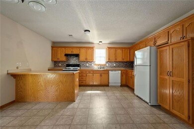 717 Coventry Ln, Raymore, MO 64083 - photo 6