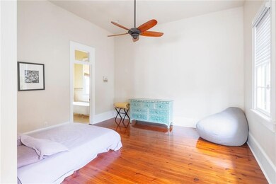 Enter into the spacious primary bedroom