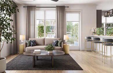 Living room with light hardwood / wood-style floor