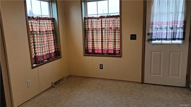 Sitting area also paired with first floor laundry