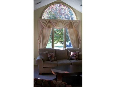 Living Room. Gorgeous palladium window allows the 