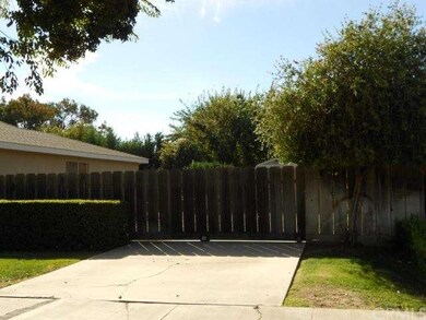 gate that opens to park RV, Has Hock ups & shed.