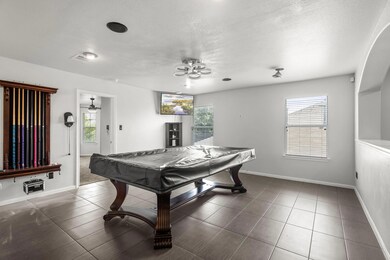 Playroom with billiards table, plenty of natural 