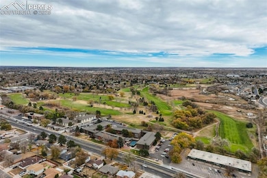 Nearby Valley Hi Golf Course (Aerial) – Wide aerial shot of Valley Hi Golf Course nearby, highlighting access to open green space and recreational amenities.