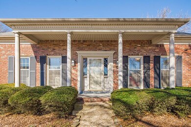 The traditional style front porch and classic bric