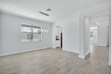 11484 Canopy Loop, Miromar Lakes, FL 33913 - photo 2