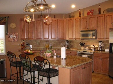Kitchen with extended granite island