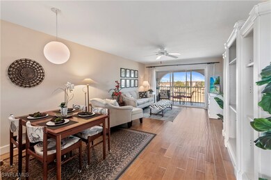 Dining room and living room, wood floors.