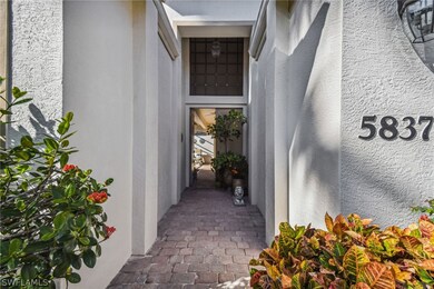 5837 Paradise Cir unit 3-13, Naples, FL 34110 - photo 3