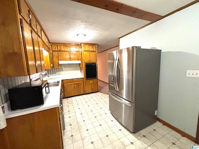 902 Ridge Dr, Weaver, AL 36277 - photo 2