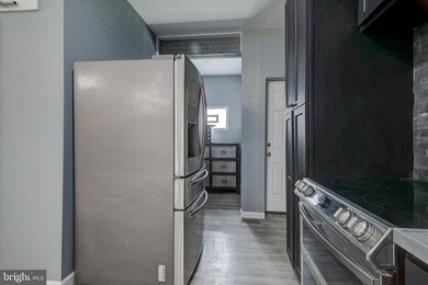 1821 E 31st St, Baltimore, MD 21218 - photo 7