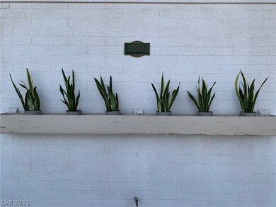 Planter in front to change out with seasonal flowe