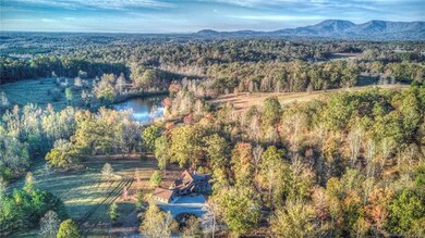 These 5.5 acres border a 20 acre pond and a horse 