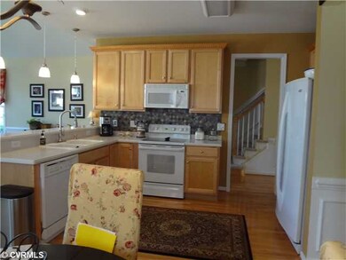Cafeteria/Kitchen - Open kitchen with hardwood flo
