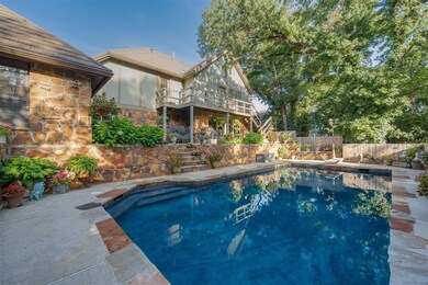 View of pool featuring a diving board