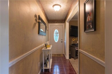 Crisp, nice entry into this home and right off of the family room.