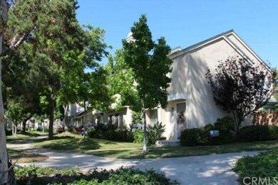 End unit on a lush landscaped greenbelt surrounded