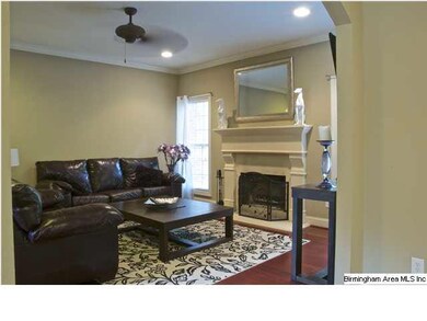 FAMILY ROOM WITH LIMESTONE FIREPLACE