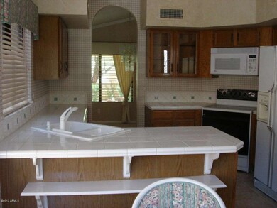 Kitchen with Tile Counters