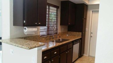 KITCHEN LEFT.  NOTE NEW DISHWASHER, GRANITE COUNTE