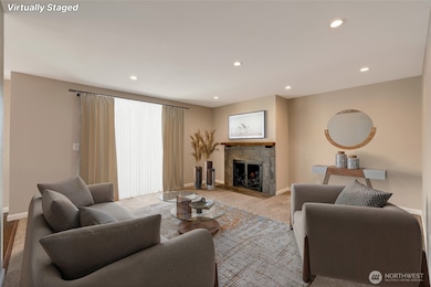 Well-lit living room with recessed lighting gives a modern, open feel.