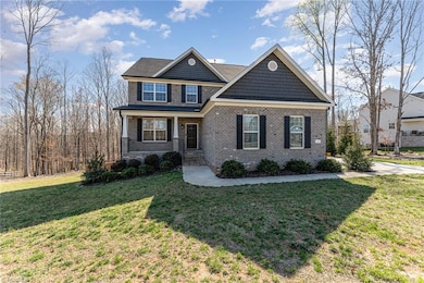 7509 Quail Crossing Rd, Stokesdale, NC 27357 - photo 3