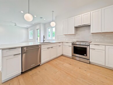 Kitchen featuring stainless steel appliances, a s