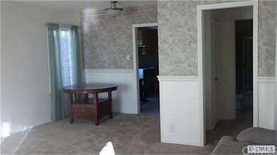 View of living room from front door entrance