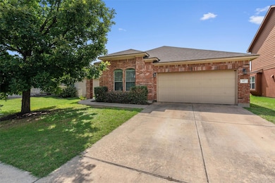 View of front of property with brick siding, an a