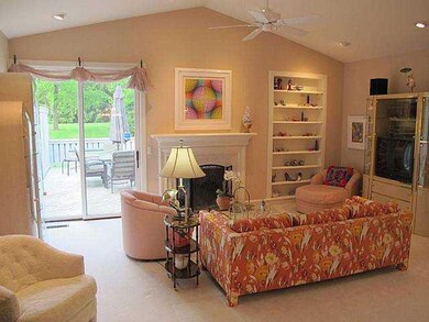 Living Room Soaring cathedral ceiling and doors to