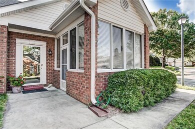 Exterior View of Front Entrance and Sunroom Entran