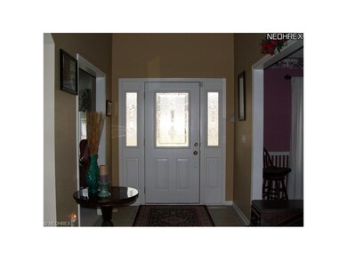 Lovely large foyer with lots of light from  the de