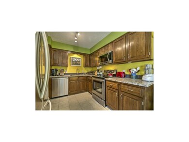 Kitchen remodeled with new appliance, tiled floori