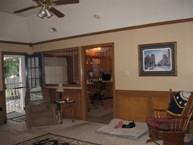 Looking out to Backyard and into Eat-In Kitchen