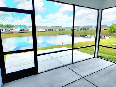 Unfurnished sunroom featuring a water view