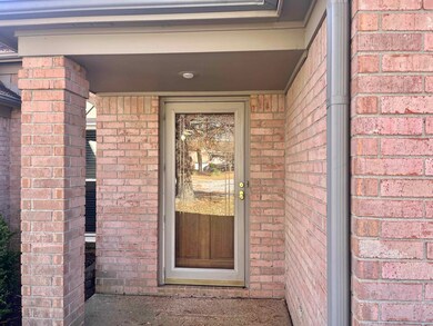 Your entrance to this lovely home is a covered por