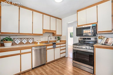 1346 Bates Dr, Colorado Springs, CO 80909 - photo 7