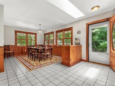 Dining area just inside the front door.