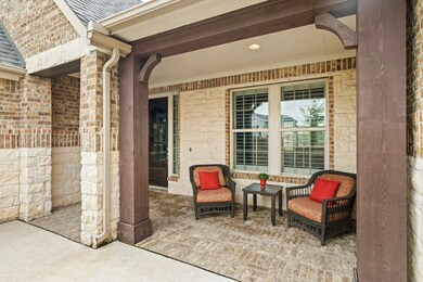 Imagine relaxing here with a cool drink in hand while waiting for Guests to arrive. There is ample space for patio furniture while the well-maintained brick flooring adds interest.