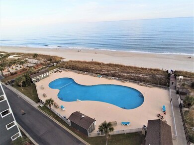 View of swimming pool featuring a water view and a