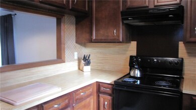 Kitchen with pass through to dining area